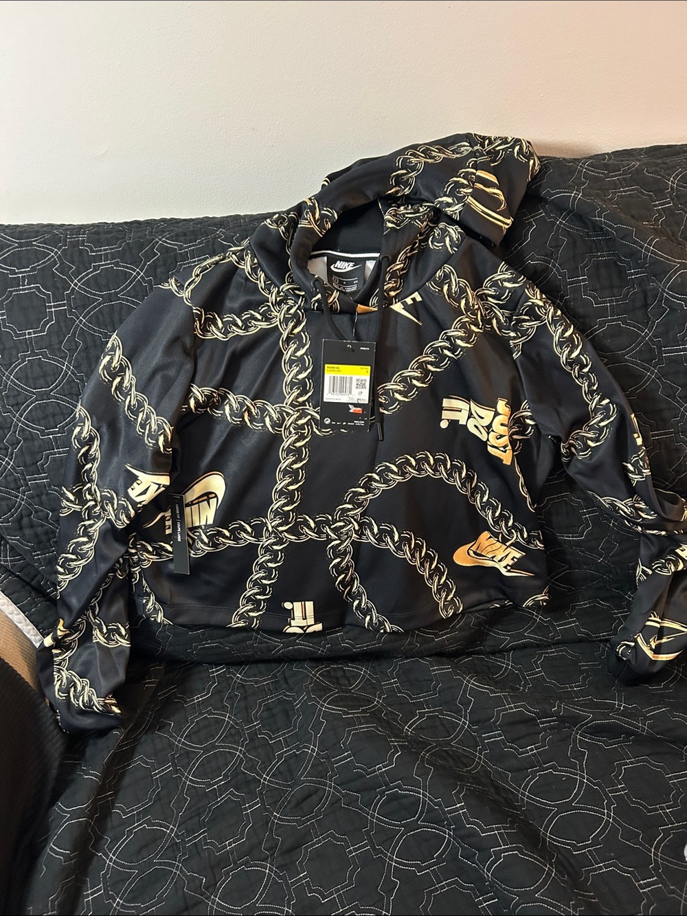 Nike women’s  Black Hoodie with Gold Chain Print